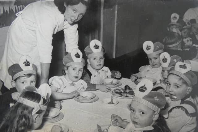 Children at what appears to be a coronation celebration party