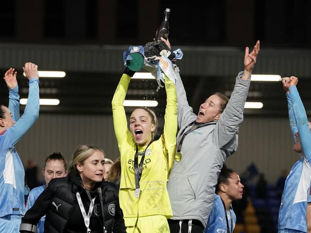 Manchester City goalkeeper Ellie Roebuck with the trophy after winning the The FA Women's Continental Tyres League Cup final at the Cherry Red Records Stadium, London: Yui Mok/PA Wire.