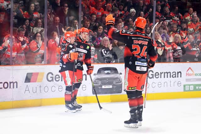 WELCOME BACK: Sheffield Steelers' Sam Jones (centre) celebrates his goal in Wednesday's Challenge Cup semi-final, second leg win over Coventry Blaze. Picture: Dean Woolley/Steelers Media