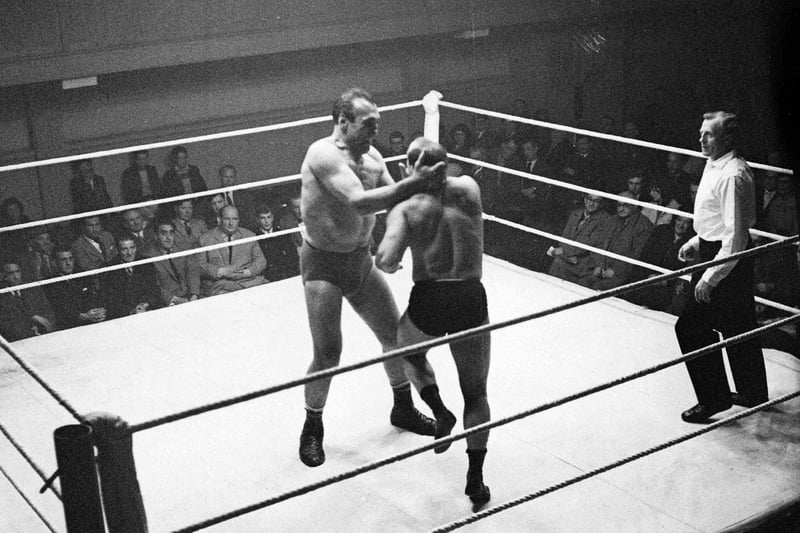 Spectators watchingh a wrestling match at Portobello Town Hall in 1960 - Primo Carnera v Geoff Portz.