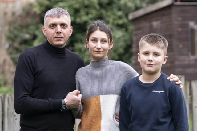 Ukrainian refugees Pavlo Romaniukha (left) with his wife Rymma Parkhomenko-Romaniukha and their son Dmytro Parkhomenko-Romaniukh, who fled Ukraine, speaking at their home in Sheffield, ahead of the first anniversary on Friday of the Russian invasion of Ukraine. PA Photo. Picture date: Wednesday February 22, 2023. Mr Romaniukha said he and his family have been touched by the welcome they have received but, on the eve of the anniversary of the Russian invasion, he warned that Vladimir Putin has to be defeated because his aggression will not stop with Ukraine. See PA story POLITICS Ukraine. Photo credit should read: Danny Lawson/PA Wire 