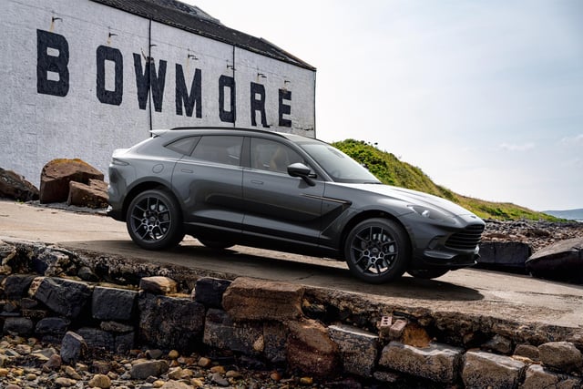 The Aston Martin DBX Bowmore Edition pictured on Islay. Only 18 of the luxury cars will be built and buyers will be invited to an exclusive road-trip ending on the island.