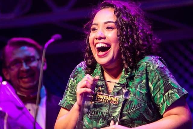 Surprise and delight shows on the face of Sheffield actor Becca Lee-Isaacs on winning Best Early Career Newcomer at the UK Pantomime Awards