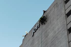Workcrews abseiled off of the roof of the store in Barkers Pool to remove the last letters of the John Lewis sign from Sheffield's skyline.