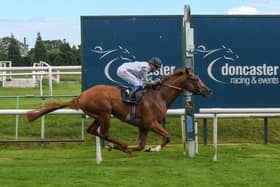 Tyson Fury ridden by Megan Nicholls wins Follow At The Races On Twitter Novice Stakes at Doncaster Racecourse.