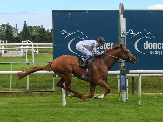 Tyson Fury ridden by Megan Nicholls wins Follow At The Races On Twitter Novice Stakes at Doncaster Racecourse.
