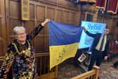 Sheffield Lord Mayor Sioned-Mair Richards and Oleksandr Symchyshyn, mayor of Khmelnytskyi, holding a Ukrainian flag signed by fighters on the front line at an official twinning ceremony held during a Sheffield City Council meeting. Picture: LDRS