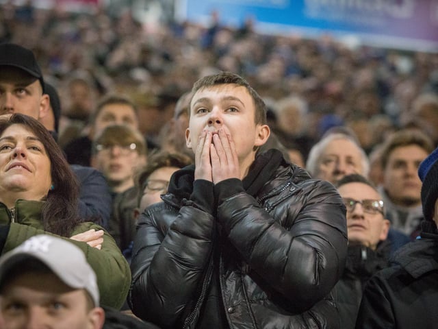 Pompey fans show emotion as Arsenal score their second goal.
