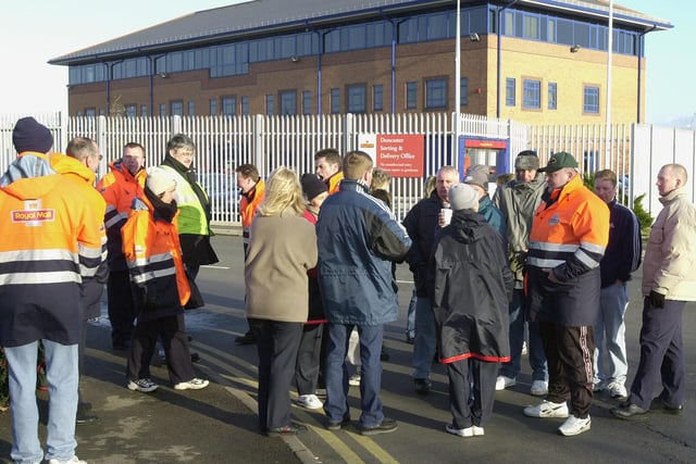 Postal workers on picket duty outside the Royal Mail depot at Middle Bank, off White Rose Way, Doncaster in December 2000