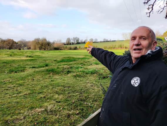 Homeowner Andrew Challoner points to the path HS2 would have carved through the field 300 yards from his home in Worksop Road - he is one of the people this reader believes are glad about HS2's eastern leg being scrapped.