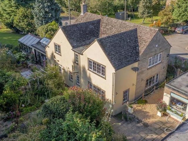 Another aerial view of the exterior of the Mansfield Road property. This time, it shows the back.