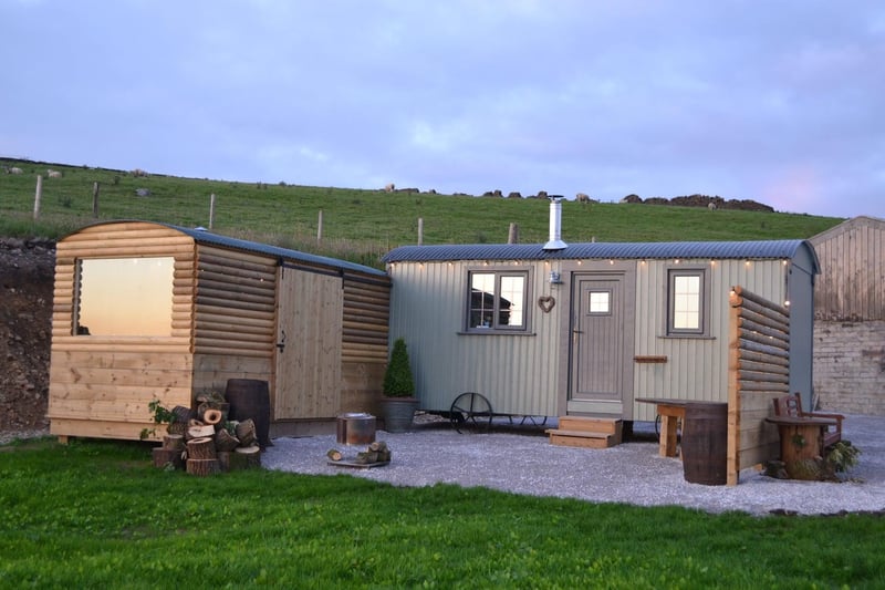 This site features two beautifully appointed shepherd huts with panoramic views along the Yorkshire/Lancashire border. Each hut has an adjoining log cabin with an indoor seating area and fresh water hot tub.