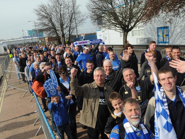 Fans get ready to board their buses for Wembley at Fratton Park.