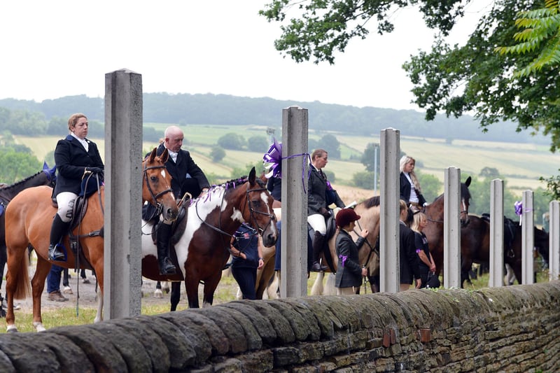 Horse riders who had earlier formed a guard of honour outside the church.