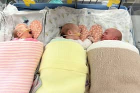 Pictured (L-R) Thea, Lily, Esmae. A set of adorable identical triplets who doctors said were all boys turned out to be all girls - and they have finally been reunited for the first time since their birth. See SWNS story SWSYtriplets. A mum has given birth to rare naturally-conceived identical triplet girls - after being told they'd all be boys. New parents Jake Hammerton, 22, and partner Caitlin Knight, 20, were thrilled when they learned Caitlin was pregnant. The couple, from Deepcar, Sheffield, found out at their 22 week gender scan they were having identical triplet boys - a 1 in 200 million case without IVF. 