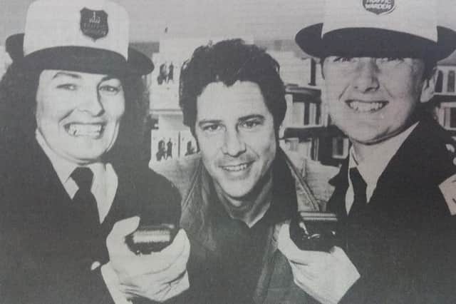 Shakin’ Stevens dropped into Woolworths in Kirkcaldy to sign his latest album and was joined by traffic wardens Marion Cowan and Tish Coulthard.