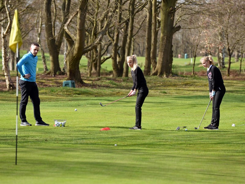 PGA professional Danny Cowell, pictured with twins Poppy and Rosie Clish, 12, during Easter Camp.