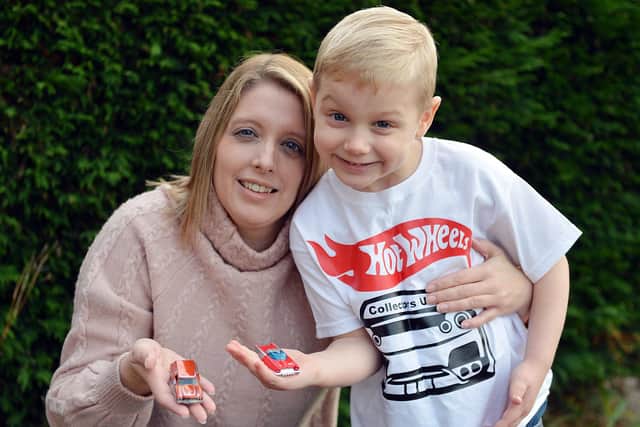Lewis Copley, aged four, pictured with his mum Claire Ratcliffe, has been gifted dozens of Hot Wheels cars
