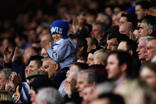 A young Owls fan gets behind the team during the League One Steel City derby against the Blades in February 2012.