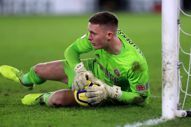 Sheffield United goalkeeper Dean Henderson makes a save during a Premier League match at Bramall Lane, Sheffield: Mike Egerton/PA Wire.