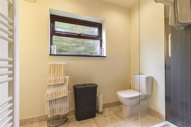 This ground-floor room has an electric shower, wash basin and wc.