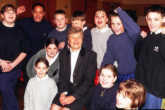 Firth Park school teacher Anne Goodwin pictured with some of her pupils from Y7  who have nominated her for a top teacher award (April 1999)