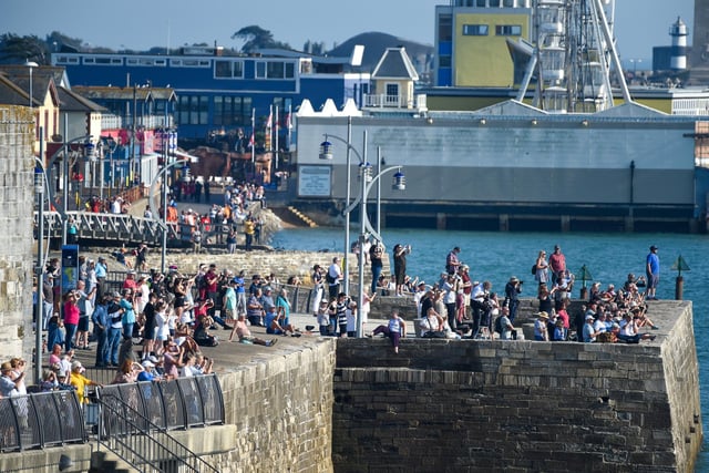 Crowds gather to give HMS Queen Elizabeth a proper send off. Picture: Finnbarr Webster/Getty Images