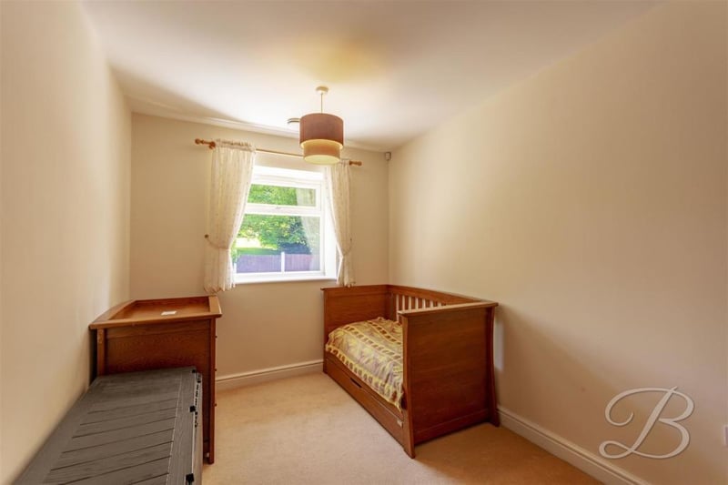 Another well-appointed bedroom. It offers plenty of potential to accommodate your own ideas.