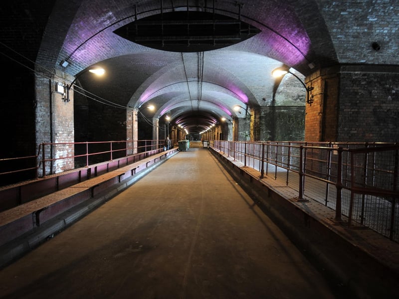Based on Dark Neville Street, the landmark construction was first built to support the Leeds City Station structure above. The Dark Arches at Granary Wharf are a network of brick arches and the River Aire runs underneath and through them.