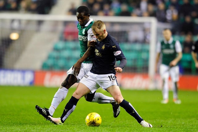 Craig Sibbald is challenged by Marvin Bartley