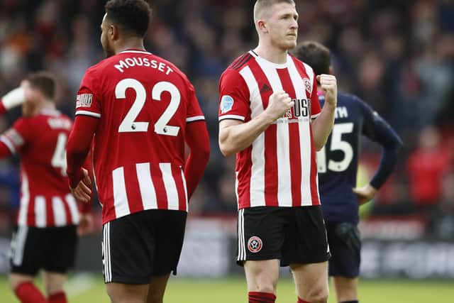 John Lundstram will hope to feature when Sheffield United face Norwich City in the Premier League at Bramall Lane this weekend: Simon Bellis/Sportimage