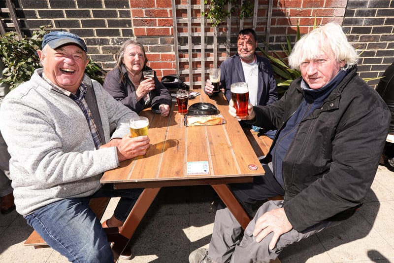 From left, Sid Kennett, Dee Miller, James Pimm and Trevor Evans. Drinkers enjoy the sunshine at the Parchment Makers, HavantPicture: Chris Moorhouse (jpns 240421-17)