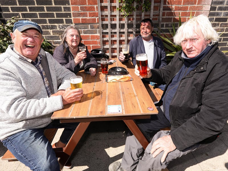 From left, Sid Kennett, Dee Miller, James Pimm and Trevor Evans. Drinkers enjoy the sunshine at the Parchment Makers, HavantPicture: Chris Moorhouse (jpns 240421-17)