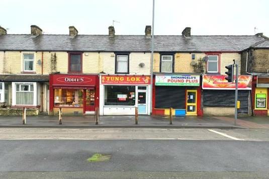 Established commercial property on the front of a busy main road with sitting tenants operating a family-run business - offers in the region of £208,000.