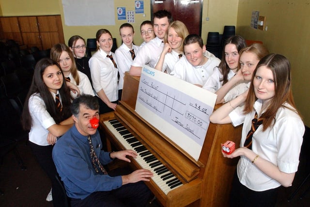 A 2003 scene at Jarrow School where teacher Rob Coulson was pictured with pupils on Red Nose Day. Can you spot anyone you know?
