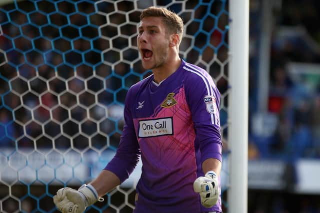 Former Doncaster Rovers goalkeeper Marko Marosi has been linked with a move to Sheffield Wednesday.