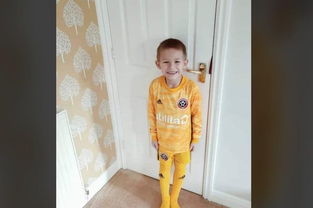 Six-year-old Charlie Hobson in his Blades goalkeeper kit.