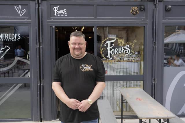 Jason Wilson, co-owner of Forbes Barbers