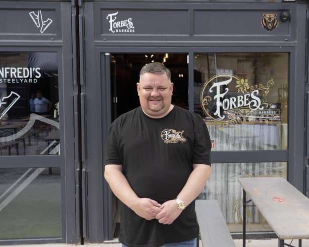 Jason Wilson, co-owner of Forbes Barbers