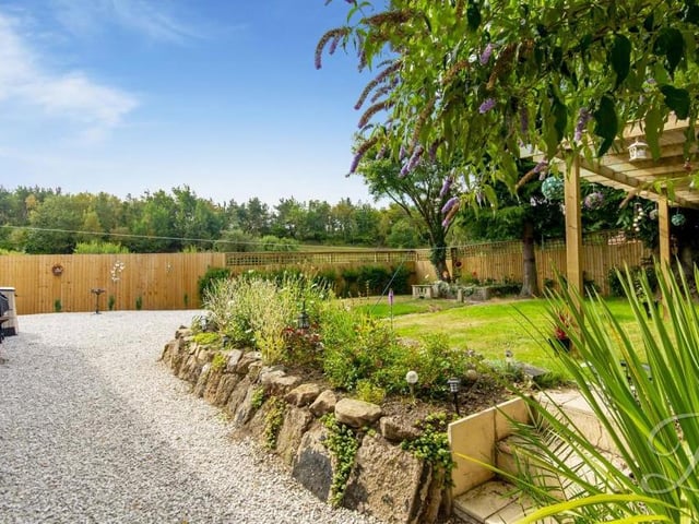 As we say farewell to the Forest Town home, here is another view of the garden. Spot the rolling countryside in the distance.
