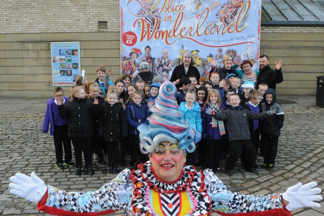 Pupils and teachers from Hebburn Lakes with Elizabeth Kane, back row centre, and Ray Spencer, front, who plays the Dame in Alice in Wonderland. Remember this from December 2015?