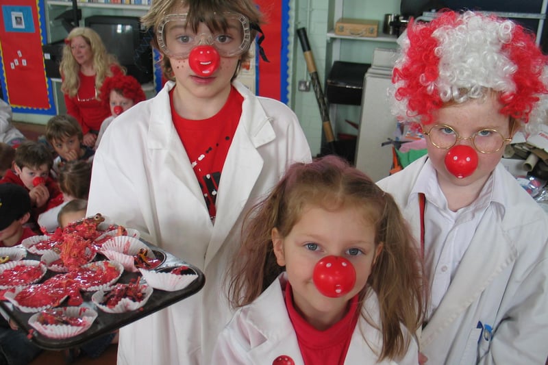 Adam Green, Megan Wilkinson and Jack Easom (left to right)  celebrate Red Nose Day as mad scientists at Wessington Primary School in 2009.