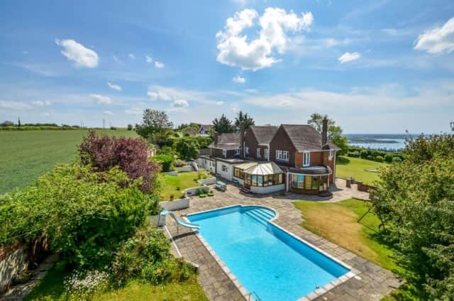Green Dolphins is on sale for £1.6m in Portchester and comes with a heated outdoor swimming pool.