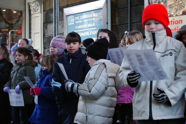 The Simonside Primary School choir provided Christmas cheer when they sang for the Christmas crowds in King Street in 2003.