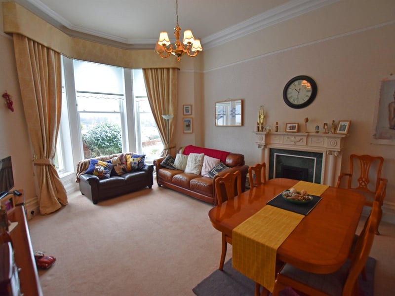 Bay-fronted lounge with fireplace.