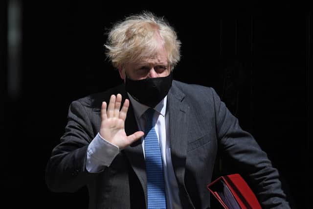 Prime Minister Boris Johnson is expected to set out his plans for 'Freedom Day' later today, including which restrictions he will be lifting on July 19 and whether or not we will have to continue to wear face masks. Photo by DANIEL LEAL-OLIVAS/AFP via Getty Images.