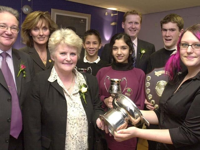 Some of the prize-winning Yewlands School Technology College pupils Dominic Smith, Hamnah Bhatti, James Bullos and Kayleigh O'Keefe with sponsors Steve Tagg, Sheffield Forgemasters Rolls, Mrs Marilyn Wrather, WHSmiths Meadowhall, and Mr Kevin O'Halloran, WHSmiths, and headteacher Angela Armytage in October 2002