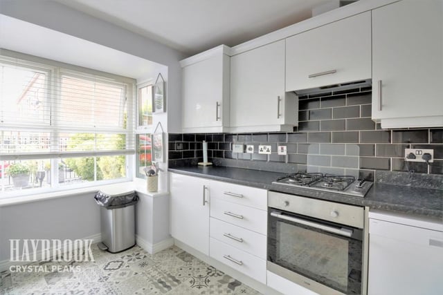 The ground floor of this four-bed family home consists of the lounge/diner, a WC and this excellently finished family kitchen. Similarly to the living room, it looks out onto the garden through a large window, which lets in loads of light.