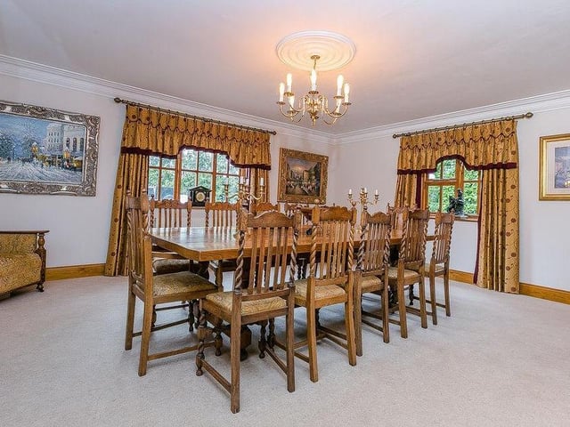 A set of double doors leads to this grand, double-aspect dining-room. It is an excellent place to seat up to 18 people.