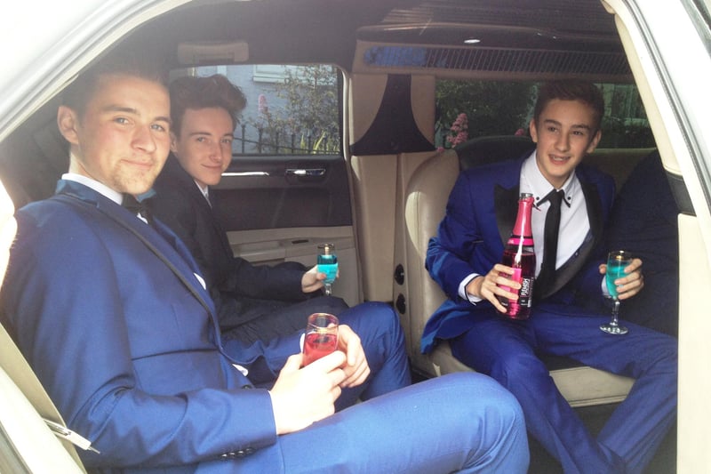 Students from Springs Academy waiting for their ride in a limousine to the school prom